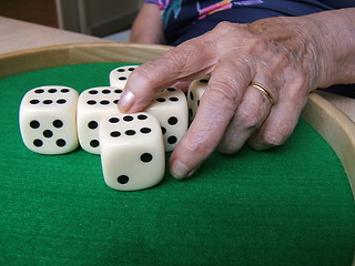 Image showing Senior playing dice