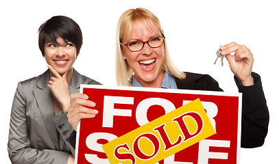 Image showing Female with Blonde Woman Holding Keys and Sold For Sale Sign