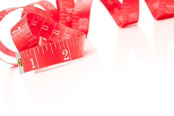 Image showing Red Measuring Tape on White
