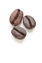 Image showing Three Roasted Coffee Beans on White