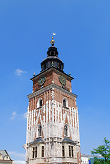Image showing Town hall with clock in summer Krakow