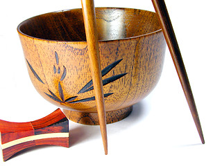 Image showing  Wooden bowl and chopsticks suggestion-over white background