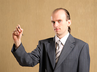 Image showing Businessman writing something