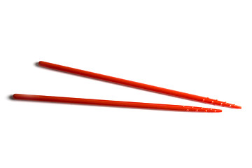 Image showing Red chopsticks isolated on white