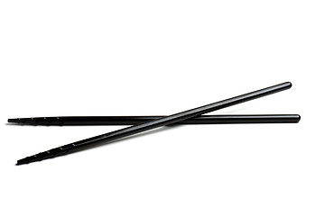 Image showing Black chopsticks isolated on white 