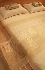 Image showing Satin and lace bed - home interiors