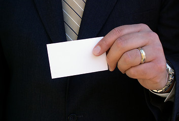 Image showing holding a business card