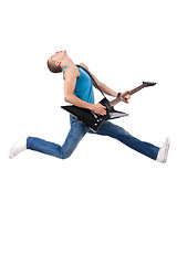 Image showing Awesome guitar player jumps