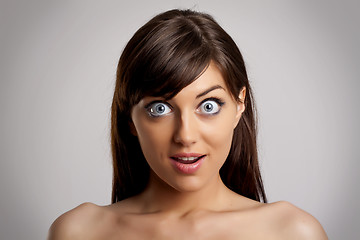 Image showing surprised young woman