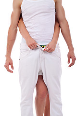 Image showing  woman unbuttoning pants