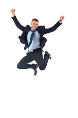 Image showing happy businessman jumping