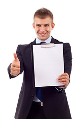 Image showing man presenting a clipboard