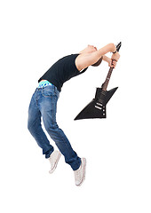 Image showing guitarist breaking his guitar