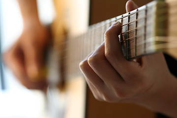 Image showing Playing guitar