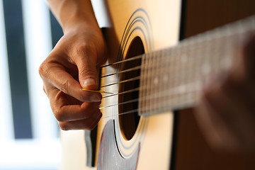 Image showing Playing guitar