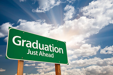 Image showing Graduation Green Road Sign Over Clouds