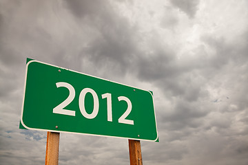 Image showing 2012 Green Road Sign Over Storm Clouds