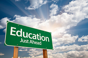 Image showing Education Green Road Sign Over Clouds