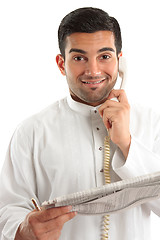 Image showing Happy businessman with financial newspaper