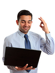 Image showing Happy businessman laptop excellent