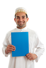 Image showing Smiling arab man with brochure