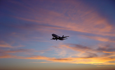 Image showing                Airplane vs. Sunset