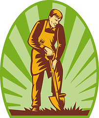 Image showing Gardener or farmer digging with shovel
