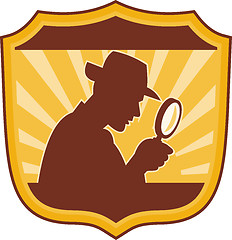 Image showing detective inspector with magnifying glass