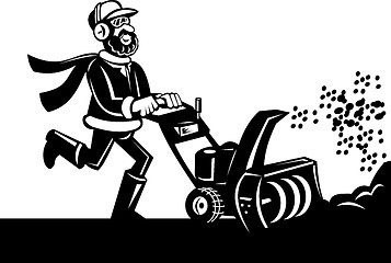 Image showing Man operating a snow blower or snow thrower 