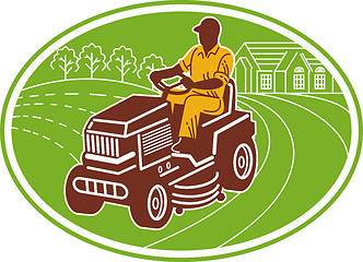 Image showing gardener riding lawn mower