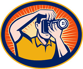 Image showing Photographer with DSLR digital camera
