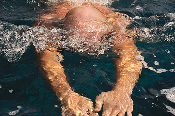 Image showing Detail of young man swimming