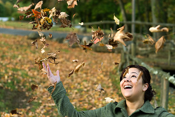 Image showing Falling Leaves Girl