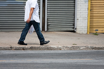 Image showing Man Walking Along