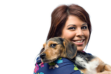 Image showing Vet Holding a Puppy