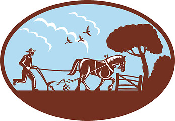 Image showing farmer plowing with horse