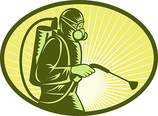 Image showing Pest control exterminator worker spraying 