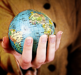 Image showing Globe in a girl's hands