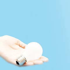 Image showing Background with lit lightbulb