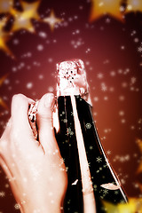 Image showing Opening champagne bottle