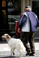 Image showing Elderly man and his dog