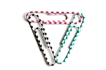 Image showing Three multicolored paperclips