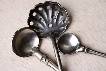 Image showing Silver Spoons on Cream