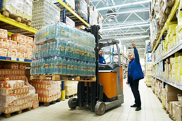 Image showing distribution in warehouse with forklift