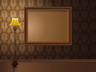 Image showing Vintage Frame hanging on wall with antique lamp.