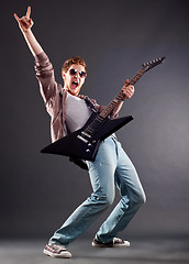 Image showing guitarist in sunglasses