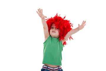 Image showing kid wearing a red feather wig