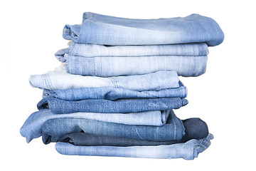 Image showing stack of blue denim jeans