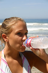 Image showing Drinking Girl
