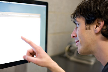 Image showing Man Pointing at Computer Screen